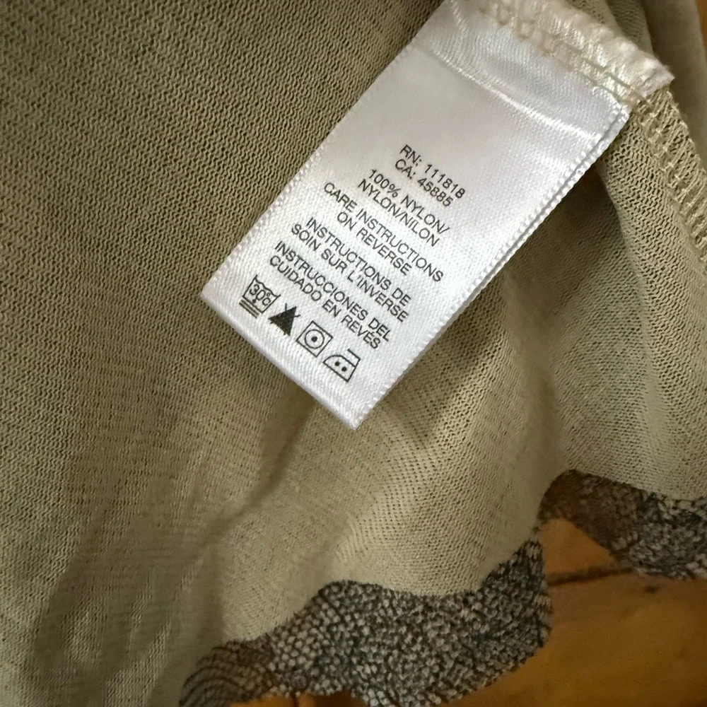 Michael Kors black and nude sleeveless blouse with an asymmetrical hem size P